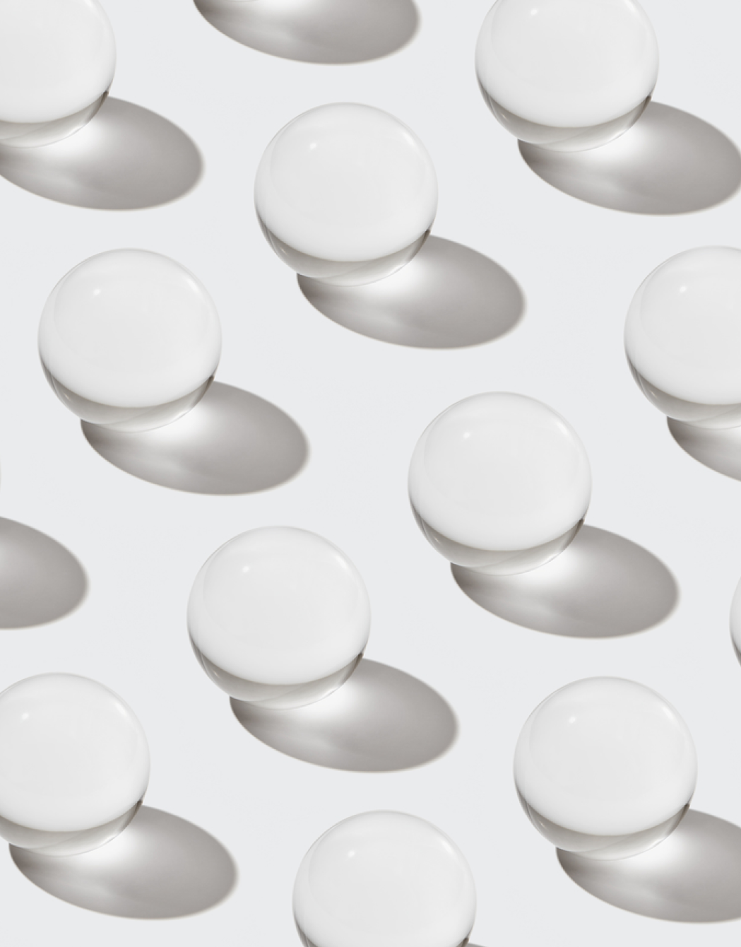 White cream, pipette dropper and clear spheres