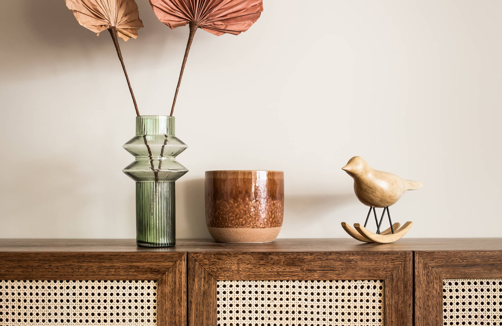 Home organization showing a vase, nick-nacks and storage