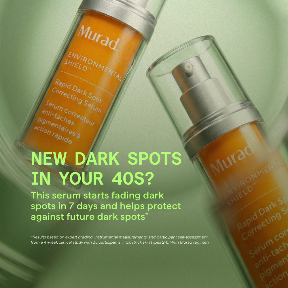 Two bottles of Murad Environmental Shield Rapid Dark Spot Correcting Serum on a green background